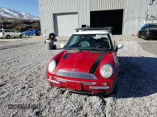 2004 MINI Hardtop with VIN WMWRC33434TC53820, listed as a Copart auction lot 85389994 with 164,452 mi miles and Salvage Title. Bid and sale history available at DreamBid. Image 10.