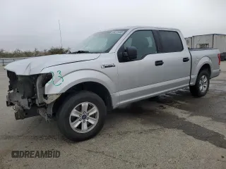 2016 Ford F-150 XLT with VIN 1FTEW1C87GFA15422, listed as a Copart auction lot 46373985 with 154,996 mi miles and Salvage title. Bid and sale history available at DreamBid. Image 1.