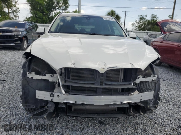 2015 BMW X5 xDrive35i z VIN 5UXKR0C58F0P03231, wystawiony jako Copart lot #60964305 z przebiegiem 71 419 mil mil oraz Szkoda całkowita • Salvage title. Historia ofert i sprzedaży dostępna na DreamBid. Obrazek 5.