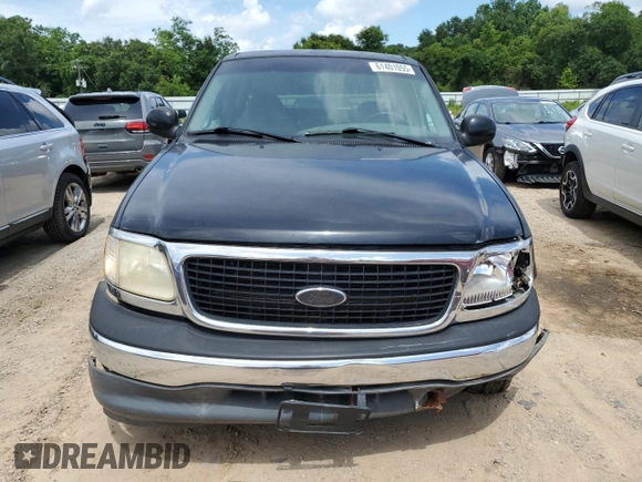 1999 Ford F-150 with VIN 1FTZX1720XKA84187, listed as a Copart auction lot 61401055 with Not provided miles and Salvage title. Bid and sale history available at DreamBid. Image 5.