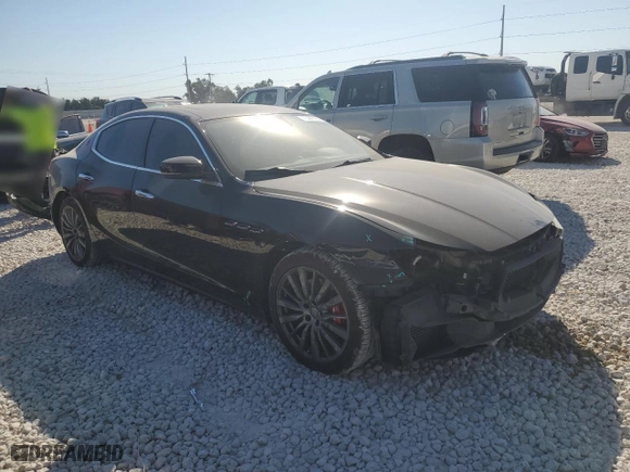 2019 Maserati Ghibli with VIN ZAM57XSA9K1312701, listed as a Copart auction lot 75387184 with NaN miles and Salvage Title. Bid and sale history available at carsss.com. Image 4.