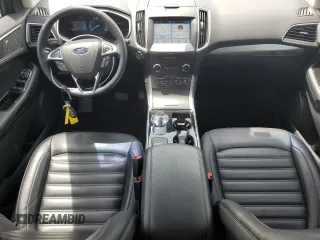 2019 Ford Edge SEL with VIN 2FMPK3J98KBC43110, listed as a Copart auction lot 54412115 with 80,685 mi miles and Salvage title. Bid and sale history available at DreamBid. Image 8.