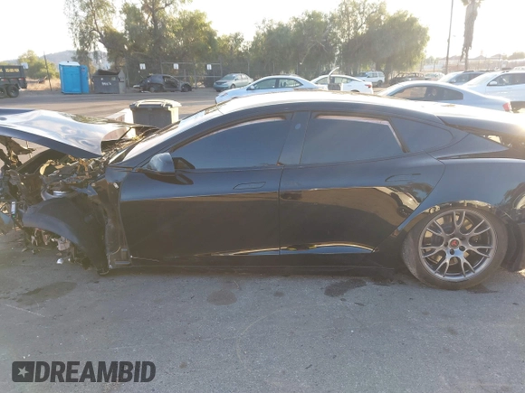 2022 Tesla Model S with VIN 5YJSA1E50NF462647, listed as a IAAI auction lot 41354668 with Not Provided miles and . Bid and sale history available at DreamBid. Image 13.