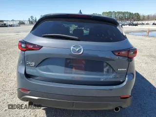 2024 Mazda CX-5 2.5 S Carbon Edition with VIN JM3KFBCM7R0373655, listed as a Copart auction lot 48697675 with 21,680 mi miles and Salvage Title. Bid and sale history available at carsss.com. Image 6.