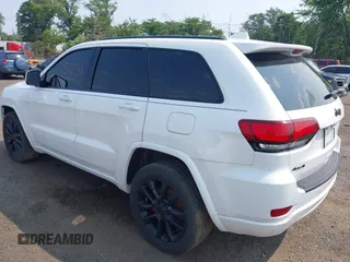 2020 Jeep Grand Cherokee Laredo E with VIN 1C4RJFAG5LC375033, listed as a IAAI auction lot 42415231 with 62,489 mi miles and . Bid and sale history available at DreamBid. Image 3.