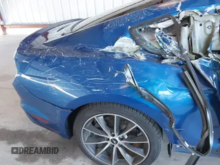 2017 Ford Mustang EcoBoost z VIN 1FA6P8TH1H5239681, wystawiony jako IAAI lot #39953332 z przebiegiem 102 035 mil mil oraz . Historia ofert i sprzedaży dostępna na DreamBid. Obrazek 18.