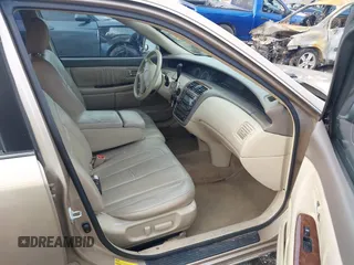2001 Toyota Avalon XL z VIN 4T1BF28BX1U141849, wystawiony jako IAAI lot #41467945 z przebiegiem 188 675 mil mil oraz . Historia ofert i sprzedaży dostępna na DreamBid. Obrazek 5.