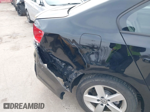 2012 Volkswagen Jetta TDI w/Premium with VIN 3VWLL7AJXCM073394, listed as a IAAI auction lot 41602574 with 159,668 mi miles and . Bid and sale history available at DreamBid. Image 6.