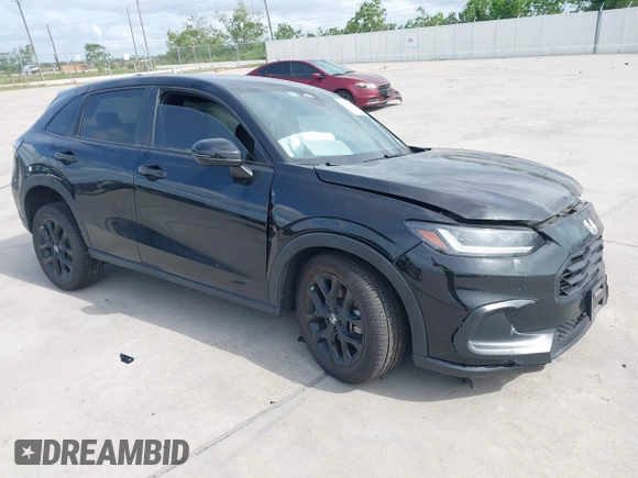2024 Honda HR-V Sport z VIN 3CZRZ1H53RM707679, wystawiony jako IAAI lot #42041371 z przebiegiem 32 383 mil mil oraz . Historia ofert i sprzedaży dostępna na DreamBid. Obrazek 1.