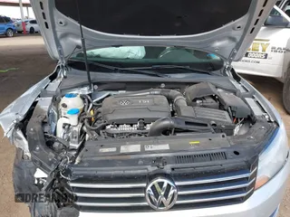 2015 Volkswagen Passat 1.8T Wolfsburg Ed with VIN 1VWAT7A31FC028990, listed as a IAAI auction lot 41778229 with 73,553 mi miles. Bid and sale history available at carsss.com. Image 10.