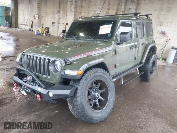 2021 Jeep Wrangler Unlimited Rubicon with VIN 1C4HJXFG4MW543254, listed as a IAAI auction lot 42316180 with 50,696 mi miles and . Bid and sale history available at DreamBid. Image 2.