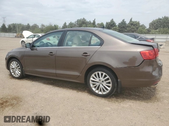 2012 Volkswagen Jetta SEL with VIN 3VWLP7AJ1CM301674, listed as a Copart auction lot 59000735 with 118,308 mi miles and Salvage title. Bid and sale history available at DreamBid. Image 2.