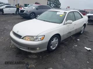 2001 Lexus ES 300 z VIN JT8BF28G410307451, wystawiony jako IAAI lot #42369871 z przebiegiem 290 620 mil mil oraz . Historia ofert i sprzedaży dostępna na DreamBid. Obrazek 2.