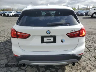 2017 BMW X1 sDrive28i with VIN WBXHU7C33H5H32827, listed as a Copart auction lot 50348265 with 117,412 mi miles and Salvage Title. Bid and sale history available at carsss.com. Image 6.