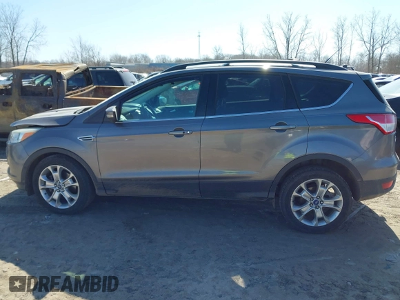 2013 Ford Escape SEL with VIN 1FMCU9H98DUB89046, listed as a IAAI auction lot 41794795 with 89,819 mi miles and . Bid and sale history available at DreamBid. Image 14.