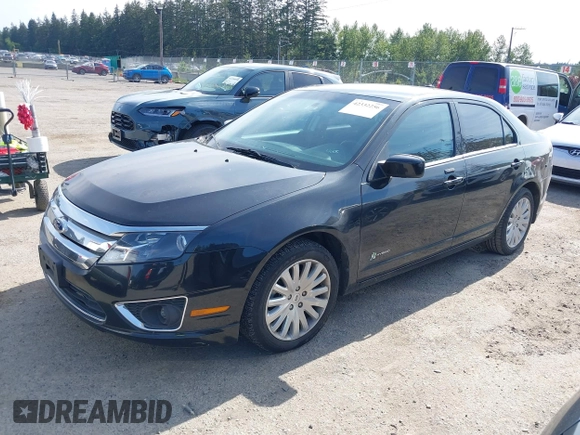 2012 Ford Fusion Hybrid z VIN 3FADP0L31CR380821, wystawiony jako IAAI lot #42332256 z przebiegiem 59 431 mil mil oraz . Historia ofert i sprzedaży dostępna na DreamBid. Obrazek 2.