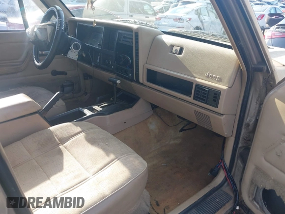 1995 Jeep Cherokee Sport with VIN 1J4FJ68S3SL555908, listed as a IAAI auction lot 42222016 with 283,444 mi miles and . Bid and sale history available at DreamBid. Image 5.