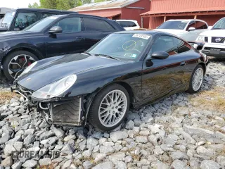 1999 Porsche 911 z VIN WP0AA2990XS626600, wystawiony jako Copart lot #56749505 z przebiegiem 82 979 mil mil oraz Szkody całkowita. Historia ofert i sprzedaży dostępna na DreamBid. Obrazek 1.