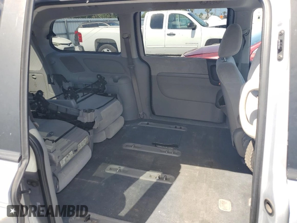 2008 Kia Sedona LX with VIN KNDMB233986220663, listed as a Copart auction lot 54321825 with 125,504 mi miles and Salvage Title. Bid and sale history available at DreamBid. Image 11.