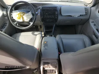 2000 Ford Explorer XLT with VIN 1FMZU83PXYZA71034, listed as a Copart auction lot 55447585 with 175,118 mi miles and Salvage title. Bid and sale history available at DreamBid. Image 8.