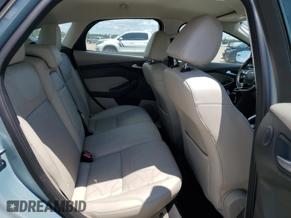 2013 Ford Focus Electric z VIN 1FADP3R44DL251179, wystawiony jako Copart lot #56572595 z przebiegiem 49 705 mil mil oraz Czysty tytuł • Clean title. Historia ofert i sprzedaży dostępna na DreamBid. Obrazek 10.