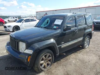 2012 Jeep Liberty Sport with VIN 1C4PJMAK8CW182731, listed as a IAAI auction lot 41982371 with 216,863 mi miles. Bid and sale history available at carsss.com. Image 2.