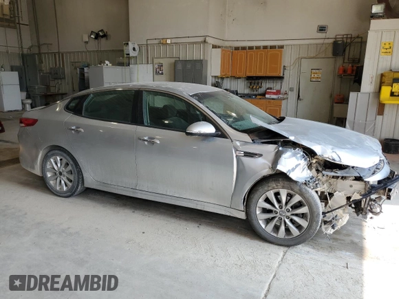 2016 Kia Optima LX with VIN 5XXGT4L35GG035838, listed as a Copart auction lot 59261495 with 128,848 mi miles and Salvage title. Bid and sale history available at DreamBid. Image 4.