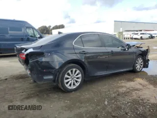 2020 Toyota Camry LE with VIN 4T1C11AK8LU916319, listed as a Copart auction lot 51277715 with 128,204 mi miles and Salvage Title. Bid and sale history available at carsss.com. Image 3.