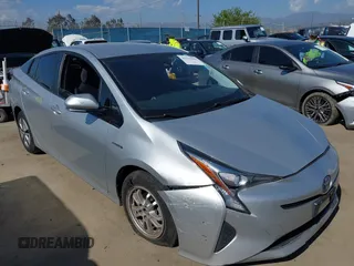 2017 Toyota Prius Two z VIN JTDKARFUXH3030573, wystawiony jako IAAI lot #42153990 z przebiegiem 194 870 mil mil oraz . Historia ofert i sprzedaży dostępna na DreamBid. Obrazek 1.