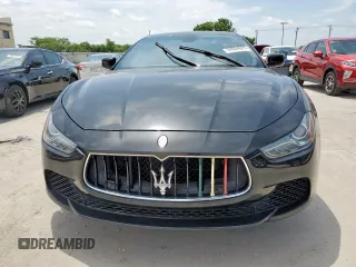 2014 Maserati Ghibli S Q4 with VIN ZAM57RTA8E1097777, listed as a Copart auction lot 59604665 with 86,135 mi miles and Salvage title. Bid and sale history available at DreamBid. Image 5.