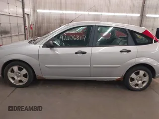2005 Ford Focus S with VIN 3FAFP37N15R138393, listed as a IAAI auction lot 42106817 with 144,047 mi miles and . Bid and sale history available at carsss.com. Image 15.