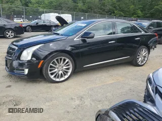 2014 Cadillac XTS Platinum z VIN 2G61W5S86E9151010, wystawiony jako Copart lot #58155335 z przebiegiem 48 437 mil mil oraz Szkoda całkowita • Salvage title. Historia ofert i sprzedaży dostępna na DreamBid. Obrazek 1.