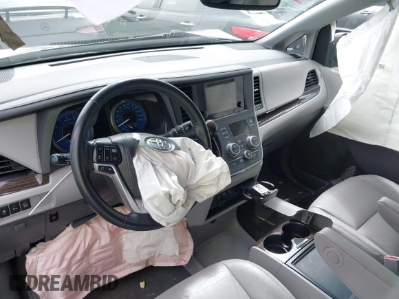 2015 Toyota Sienna XLE with VIN 5TDYK3DC6FS660410, listed as a IAAI auction lot 41801496 with 81,755 mi miles. Bid and sale history available at carsss.com. Image 20.