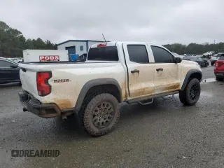 2023 Chevrolet Colorado 4WD Trail Boss with VIN 1GCPTEEK5P1255504, listed as a Copart auction lot 87727235 with 23,817 mi miles and Salvage Title. Bid and sale history available at carsss.com. Image 3.