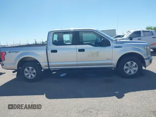 2015 Ford F-150 XLT z VIN 1FTEW1EP9FKD42687, wystawiony jako IAAI lot #42277992 z przebiegiem 160 354 mil mil oraz . Historia ofert i sprzedaży dostępna na DreamBid. Obrazek 13.