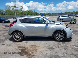 2014 Nissan Juke SV z VIN JN8AF5MV9ET359296, wystawiony jako IAAI lot #42250580 z przebiegiem 97 249 mil mil oraz . Historia ofert i sprzedaży dostępna na DreamBid. Obrazek 13.