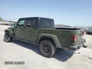 2023 Jeep Gladiator Freedom with VIN 1C6HJTAG9PL543165, listed as a Copart auction lot 47761235 with 43,614 mi miles and Salvage title. Bid and sale history available at DreamBid. Image 2.