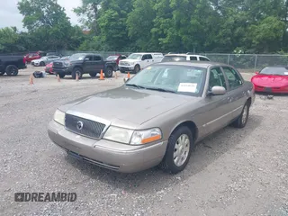 2005 Mercury Grand Marquis LS Premium z VIN 2MEFM75W25X661590, wystawiony jako IAAI lot #42534626 z przebiegiem 113 450 mil mil oraz . Historia ofert i sprzedaży dostępna na DreamBid. Obrazek 2.