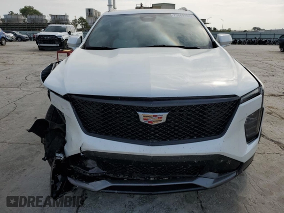 2024 Cadillac XT4 AWD Sport с VIN 1GYFZFR47RF125557, выставлен на аукционе Copart как лот 70869104 с пробегом 8 714 миль миль и Списание • Salvage title. История ставок и продаж доступна на DreamBid. Изображение 5.