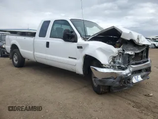 2002 Ford F-250 XL with VIN 1FTNX20F02EB92592, listed as a Copart auction lot 55834145 with 299,524 mi miles and Salvage title. Bid and sale history available at DreamBid. Image 4.