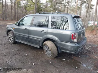 2007 Honda Pilot EX-L with VIN 5FNYF28707B042212, listed as a IAAI auction lot 41478485 with 182,849 mi miles. Bid and sale history available at carsss.com. Image 3.