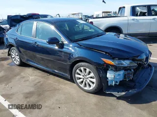 2020 Toyota Camry LE with VIN 4T1L11AKXLU999381, listed as a IAAI auction lot 41782771 with 58,526 mi miles. Bid and sale history available at carsss.com. Image 1.