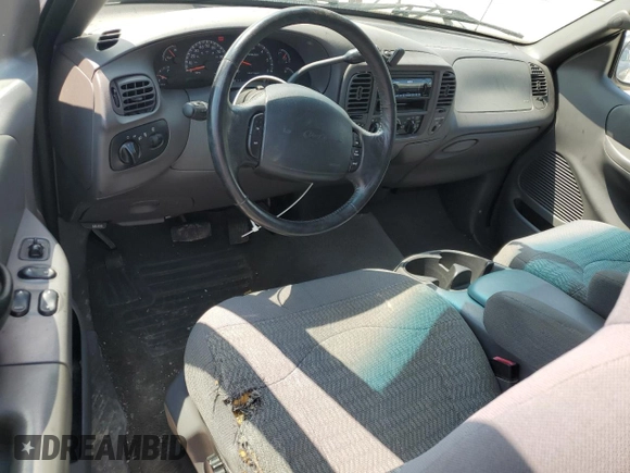 2000 Ford F-150 XL z VIN 1FTRX18L0YNA65615, wystawiony jako Copart lot #58508375 z przebiegiem Nie podano mil oraz Szkoda całkowita • Salvage title. Historia ofert i sprzedaży dostępna na DreamBid. Obrazek 8.