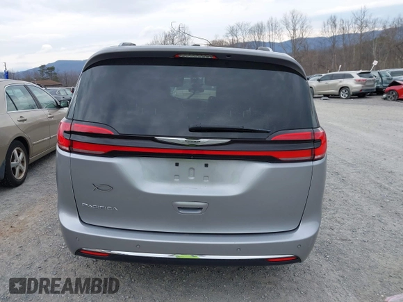 2021 Chrysler Pacifica Touring L with VIN 2C4RC1BG3MR542543, listed as a IAAI auction lot 41657073 with 118,833 mi miles and . Bid and sale history available at DreamBid. Image 17.