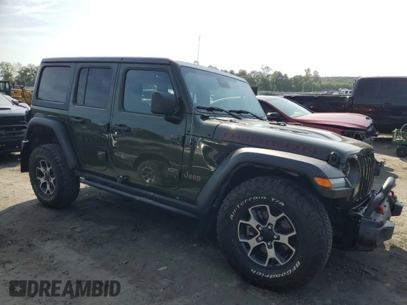2021 Jeep Wrangler Unlimited Rubicon with VIN 1C4HJXFN4MW789526, listed as a Copart auction lot 59540025 with 33,583 mi miles and Salvage title. Bid and sale history available at DreamBid. Image 4.