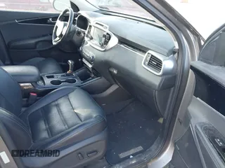 2016 Kia Sorento SX with VIN 5XYPKDA51GG031823, listed as a IAAI auction lot 42142495 with 87,132 mi miles. Bid and sale history available at carsss.com. Image 5.