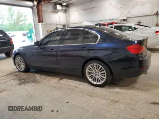 2014 BMW 3 Series 335i xDrive with VIN WBA3B9G54ENR91336, listed as a Copart auction lot 58182875 with 133,946 mi miles and Clean title. Bid and sale history available at DreamBid. Image 2.
