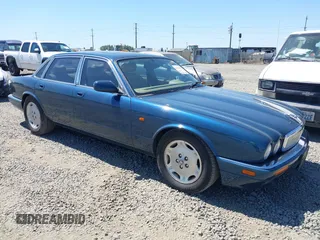1996 Jaguar XJ with VIN SAJHX1740TC766425, listed as a IAAI auction lot 42758458 with 257,849 mi miles and . Bid and sale history available at DreamBid. Image 1.