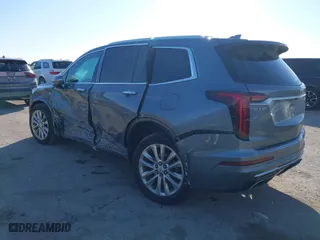 2020 Cadillac XT6 FWD Premium Luxury with VIN 1GYKPCRS8LZ129799, listed as a IAAI auction lot 41602536 with 96,865 mi miles. Bid and sale history available at carsss.com. Image 3.