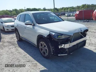 2025 BMW X1 xDrive28i with VIN WBX73EF03S5102329, listed as a IAAI auction lot 41987959 with 8,144 mi miles. Bid and sale history available at carsss.com. Image 1.